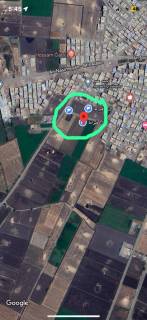 ارض زراعي للبيع وسط كاردون المباني بقرية النسيمية