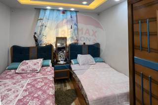 شقة مرخصة للبيع 130 متر محرم بك علي الترام مباشرة