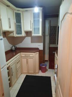 شقه 120 متر غرفتين مفروشه بكمبوند عمارات الشرطه ام