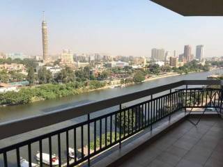 شقةمتشطبة بالتكيفات و الفرش فيو ع النيل فى القاهرة