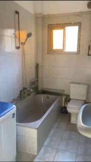 شقه مفروشه للايجار في الدقي غرفتين وحمام دور 3 اسانسير