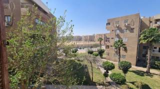 شقه للبيع 90م بالحي السابع المجاورة الأولي ب6 أكت