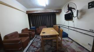 شقة مفروشة للإيجار في الدقى 65م في شارع التحرير الرئيسى