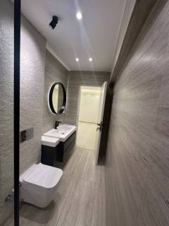 شقه 167م للبيع في الدقي برج حديث اول استخدام